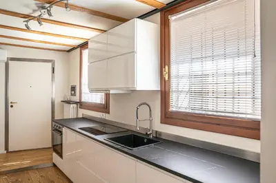 Cucina o angolo cottura di Basilica Prestige Residence, lusso e comfort