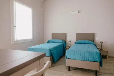 Letto o letti in una camera di Tenuta delle Radici