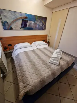 Letto o letti in una camera di Idea House