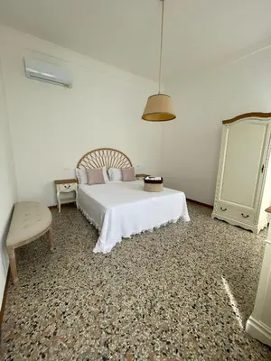 Letto o letti in una camera di Residenza Stardust Suite with Canal View