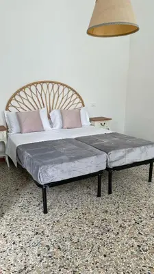 Letto o letti in una camera di Residenza Stardust Suite with Canal View