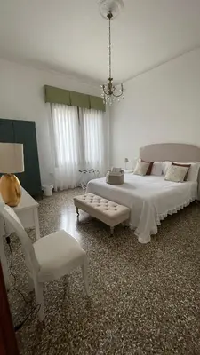 Letto o letti in una camera di Residenza Stardust Suite with Canal View