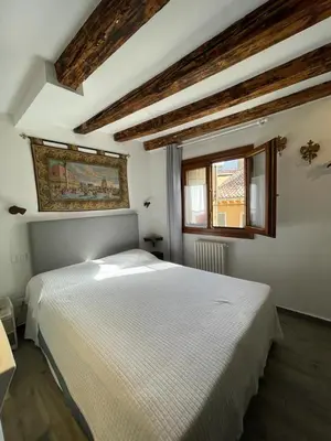 Letto o letti in una camera di Hotel ai do Mori