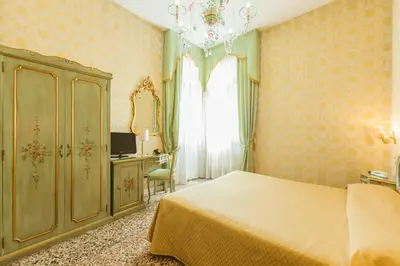 Letto o letti in una camera di Locanda Barbarigo