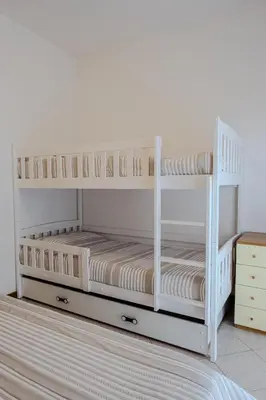 Letto o letti in una camera di Viotto Apartments