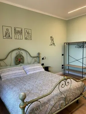 Letto o letti in una camera di La casa di Elena