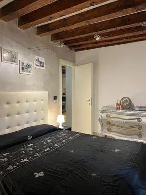 Letto o letti in una camera di LN HOMES VENICE - Ca' Tiepolo