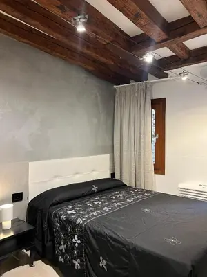 Letto o letti in una camera di LN HOMES VENICE - Ca' Tiepolo