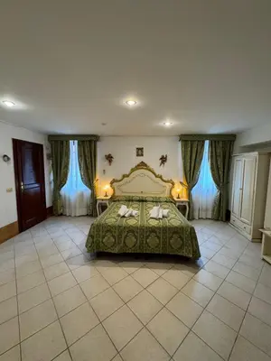 Letto o letti in una camera di Dimora Veneziana Rooms