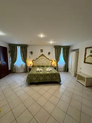Letto o letti in una camera di Dimora Veneziana Rooms