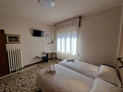 Letto o letti in una camera di Albergo D'Ambros - Casa Belfiore Group