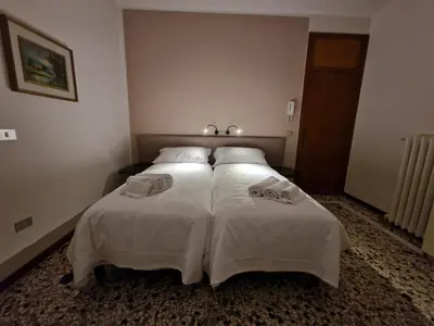 Letto o letti in una camera di Albergo D'Ambros - Casa Belfiore Group