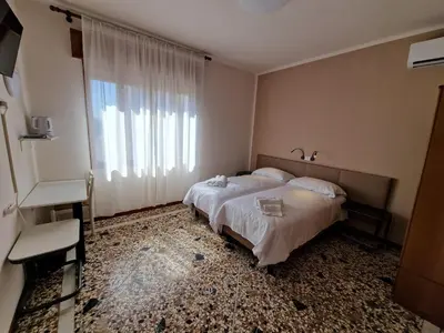 Letto o letti in una camera di Albergo D'Ambros - Casa Belfiore Group