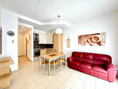 Cucina o angolo cottura di Residence Solmare - Carraro Immobiliare - Family Apartments