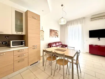 Cucina o angolo cottura di Residence Solmare - Carraro Immobiliare - Family Apartments