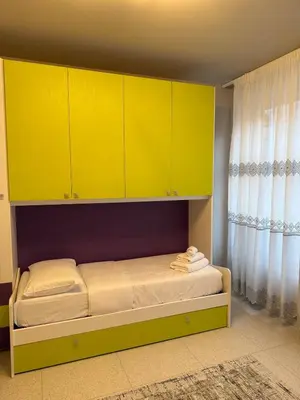 Letto o letti in una camera di Ca' Monte - Dimora Centrale con 3 camere da letto