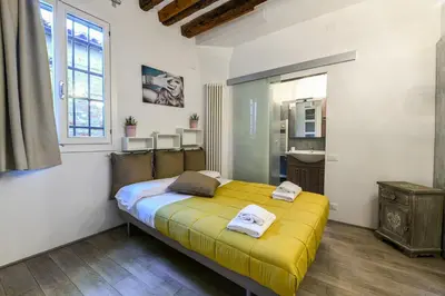 Letto o letti in una camera di La Perla