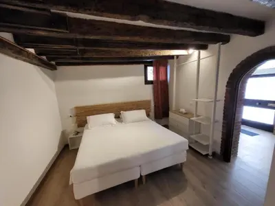 Letto o letti in una camera di Cà del Console