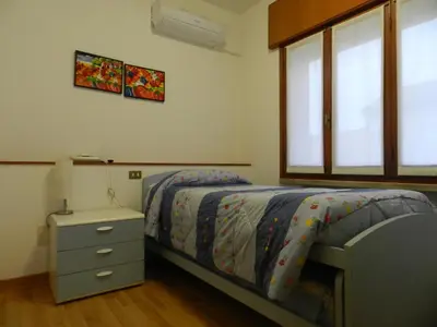 Letto o letti in una camera di Locanda Trattoria Caffè Cavour