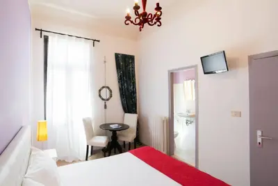 Letto o letti in una camera di Residenza Quaggio Ca' Grimani