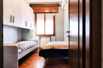 Letto o letti in una camera di San Nicola- 5 min from airport with parking