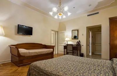 Letto o letti in una camera di Hotel Dell'Opera