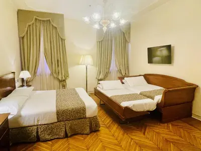 Letto o letti in una camera di Hotel Dell'Opera