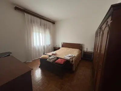 Letto o letti in una camera di casa Giovanna