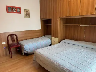 Letto o letti in una camera di Beachfront apartment free park - Jesolo beach