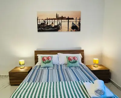 Letto o letti in una camera di United Apartment