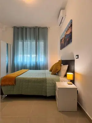 Letto o letti in una camera di United Apartment