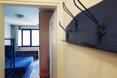 Letto o letti in una camera di Casa Penelope