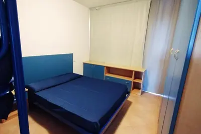 Letto o letti in una camera di Casa Penelope