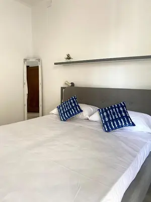Letto o letti in una camera di Fronte Mare Apartment Private Beach & Free Park