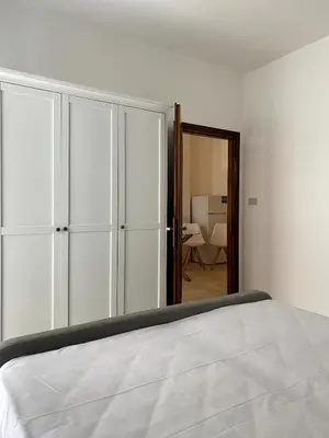 Letto o letti in una camera di Fronte Mare Apartment Private Beach & Free Park