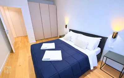 Letto o letti in una camera di HT - Basilica View Luxury Loft