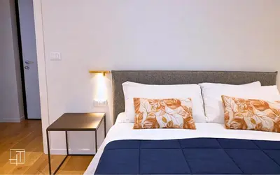 Letto o letti in una camera di HT - Basilica View Luxury Loft