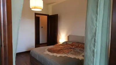 Letto o letti in una camera di Casa della Nonna Rooms