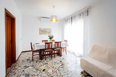 Area soggiorno di Liviana Apartment