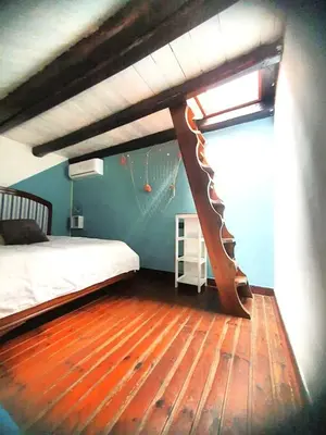 Letto o letti in una camera di Ca' del Bovolo