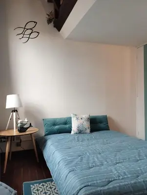 Letto o letti in una camera di Ca' del Bovolo