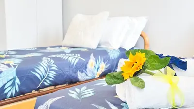 Letto o letti in una camera di Casa Solare by Ca-Sa Check