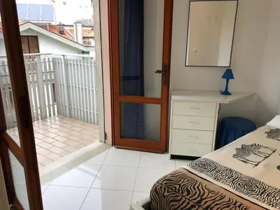 Letto o letti in una camera di RESIDENCE GALLO - WALTERIGATO Apartments PER SOLO FAMIGLIE
