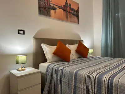 Letto o letti in una camera di Casa Duca D'aosta
