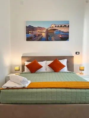 Letto o letti in una camera di Casa Duca D'aosta