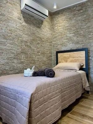 Letto o letti in una camera di Stanze Stevanato