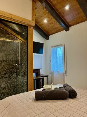Letto o letti in una camera di Stanze Stevanato