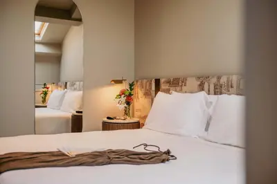 Letto o letti in una camera di Rimon Place Kosher