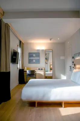 Letto o letti in una camera di Hotel Casa W