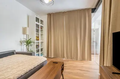Letto o letti in una camera di GuestHost - Bright Apartment near Mestre Station